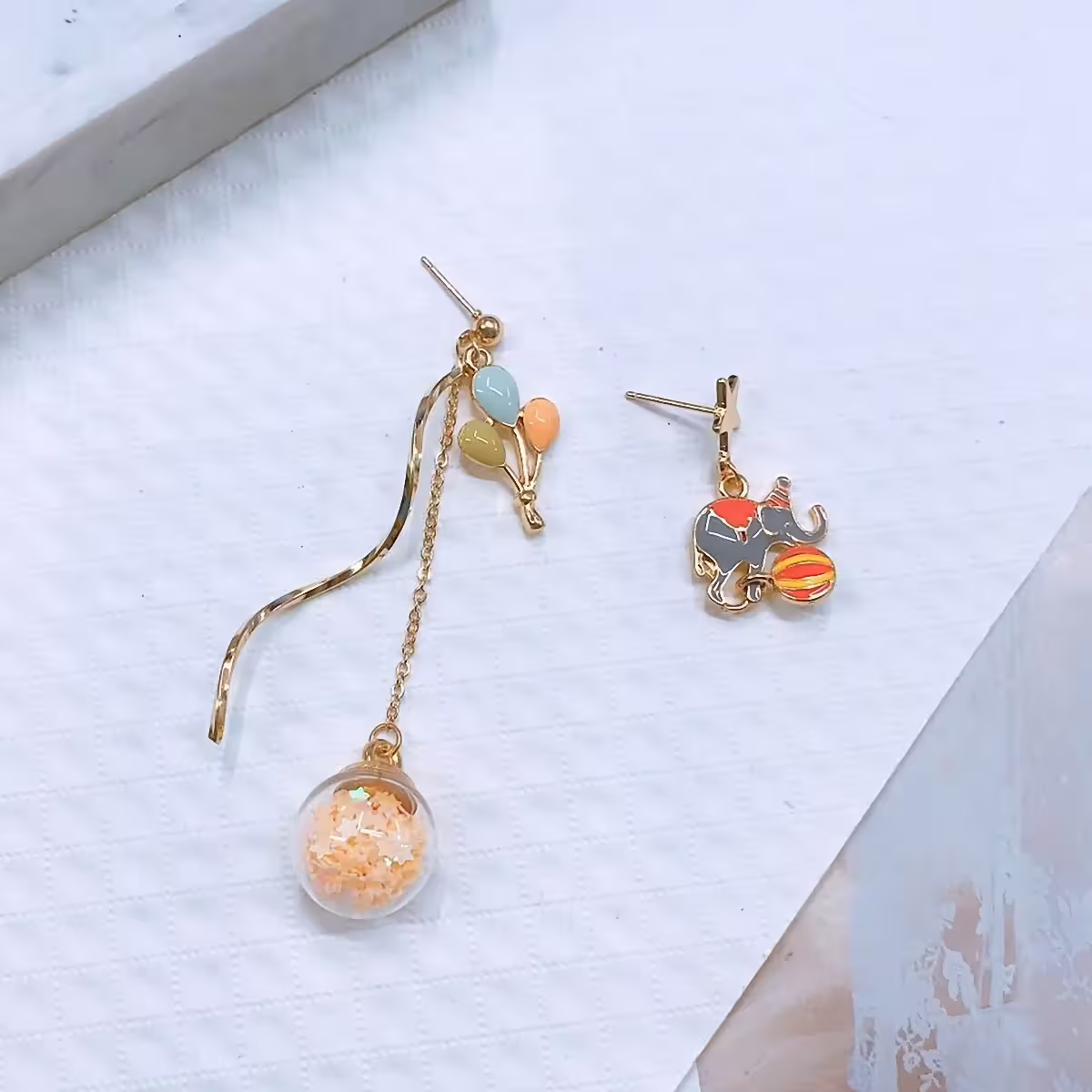 馬戲團小飛象×不對稱吊墜耳環-第1張