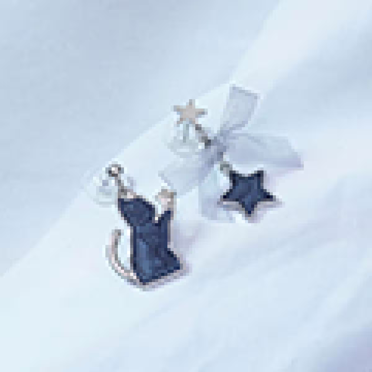 炫藍貓咪蝴蝶結星星×不對稱吊墜耳環-第1張