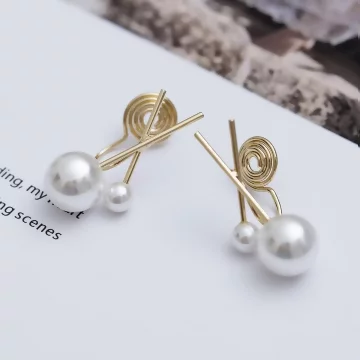 二顆交叉珍珠×蚊香盤U型耳夾.avif