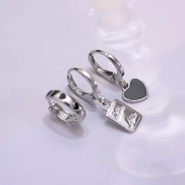 冷酷黑愛心×單邊六套件耳環組.avif