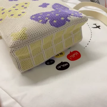 紫蝶蝴飛×針織×斜背包.avif