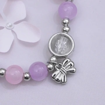 甜美蝴蝶結透粉琉璃×固定式串珠手鍊.avif