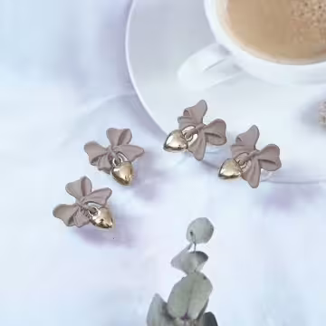 棕咖領結金色愛心×蚊香盤U型耳夾