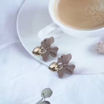 棕咖領結金色愛心×蚊香盤U型耳夾