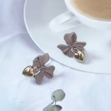 棕咖領結金色愛心×蚊香盤U型耳夾