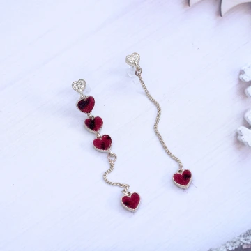 植絨紅豹愛心&times;不對稱吊墜耳環.avif