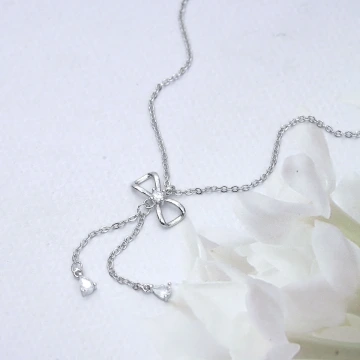 八字蝴蝶結流蘇&times;鎖骨項鍊.avif