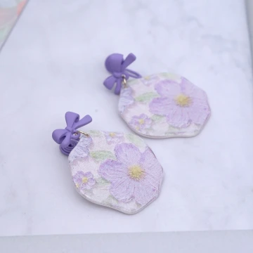紫花蝴蝶結&times;吊墜耳環.avif