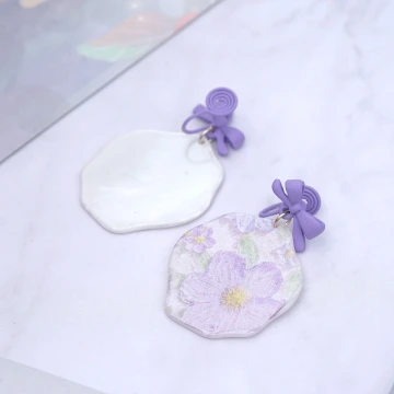 紫花蝴蝶結&times;吊墜耳環.avif