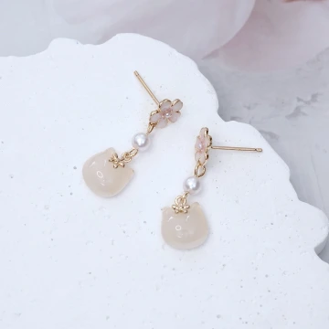 十字纏繞晶鑽&times;吊墜耳環.avif