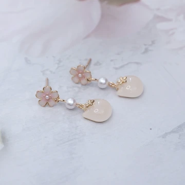 十字纏繞晶鑽&times;吊墜耳環.avif